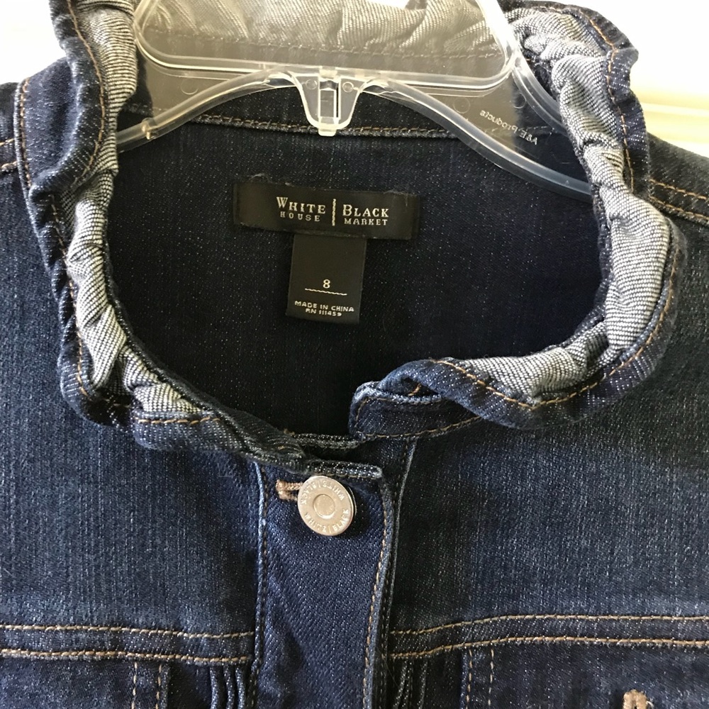 Denim jacket with ruffle trim